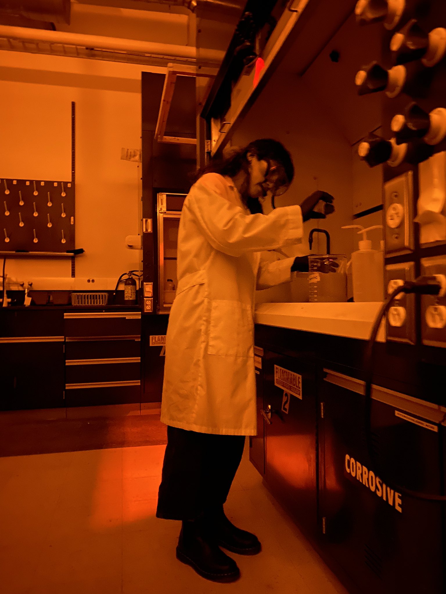 Dark Lab preparing IRSL samples at the Luminescence Lab at the USGS Facilities, Lakewood, CO.